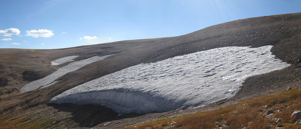 Figure 2: View of ice patches in the Greater Yellowstone Area. Ice patches that hold valuable cultural items are often found in remote areas.
