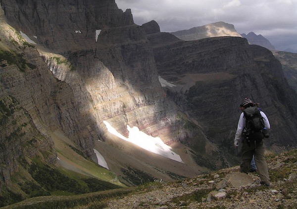 Figure 6: Don Sam of the Kootenai Tribe heads down a valley in Glacier National Park to investigate an ice patch.