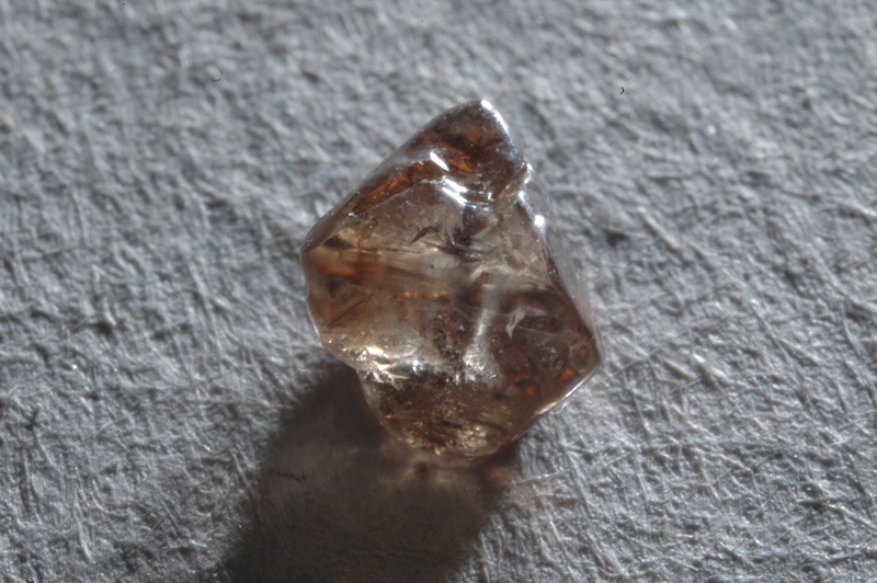 Figure 4b: An uncut diamond crystal is clear and is the hardest substance known.

