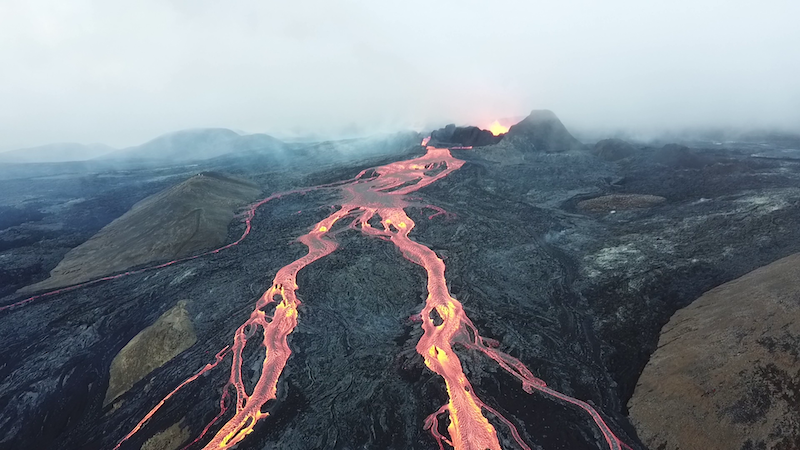 Figure 3: Lava flowing out of Iceland's Fagradalsfjall volcano in 2021, which is cooling to form the extrusive igneous rock called basalt.