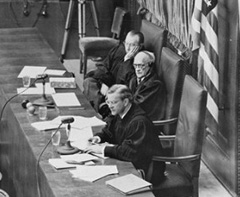 Figure 3: The judges' chamber from the Nuremberg Trials.