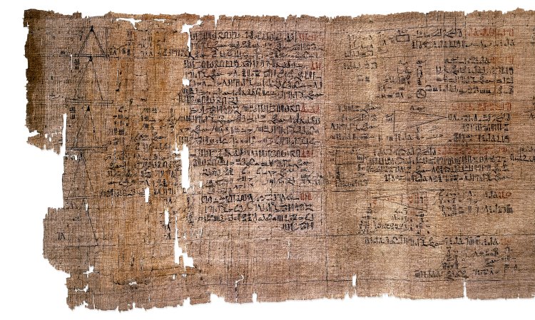 Figure 3: A fragment of the Rhind mathematical papyrus, written in 1650 BCE in Egypt, showing a problem that involves a geometrical progression.
