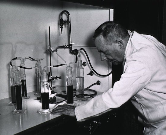 Figure 2: Dr. Otto Warburg and his manometer.  The instrument, adapted from devices that measure gases dissolved in blood, determines the rate at which living cells produce oxygen.