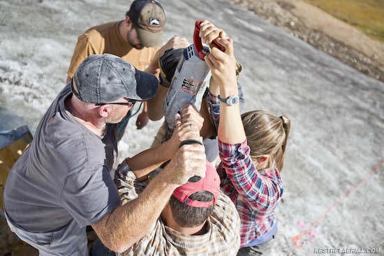 Figure 9: A field team led by Craig Lee and co-principal investigators David McWethy (Montana State University) and Greg Pederson (US Geological Survey) drilling a core from an ice patch in the Greater Yellowstone Area.