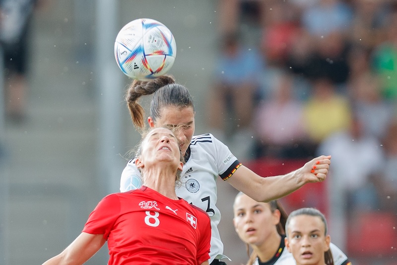 Figure 4: Two players vying to head a soccer ball.
